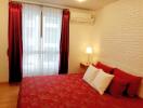 Cozy bedroom with red and white decor