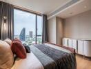 Modern bedroom with a city view