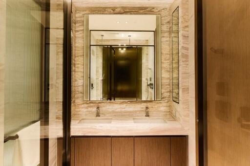 Modern bathroom with double sink and large mirror