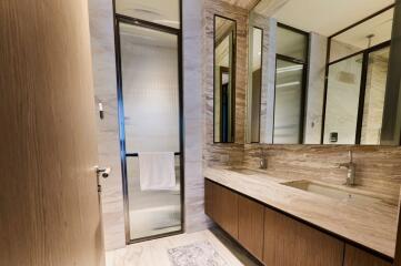 Modern bathroom with dual sinks and sleek design