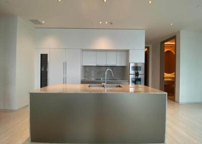 Modern kitchen with island and built-in appliances