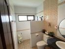 Modern bathroom with tiled walls and a built-in vanity