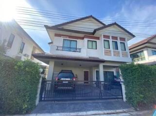 Two-story residential house with a modern design