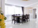 Bright and spacious dining room with modern furniture