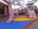 Colorful children's playground with slides and climbing structure