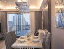 Modern dining area with setup table and city view