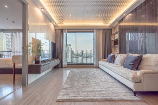 Modern living room with natural light and a large window