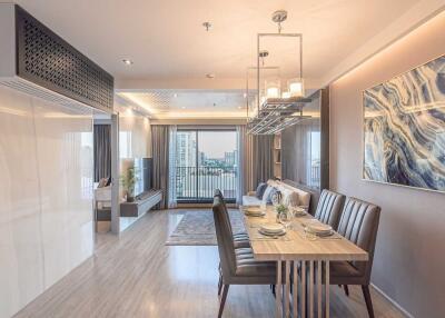 Modern living and dining area with city view