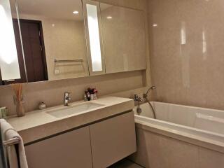 Modern bathroom with bathtub and vanity