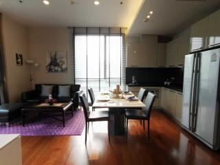 Modern open plan living and dining area with kitchen