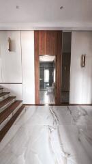 Modern entrance with marble flooring