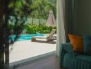 Living area overlooking a beautiful pool