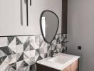 Modern bathroom with geometric tile design