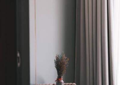 Cozy bedroom corner with a table and chair