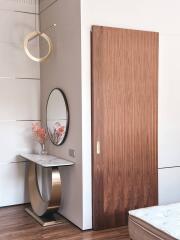 Modern bedroom corner with sliding door and decorative elements