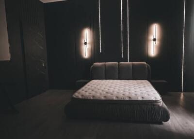 Modern minimalist bedroom with ambient lighting