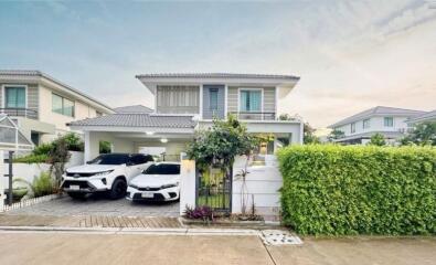 Beautiful two-story house with a garden