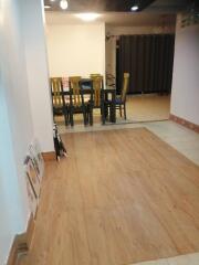 Dining area with wooden flooring and dining table