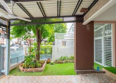 Cover photo of outdoor patio with garden