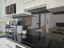 Modern kitchen with appliances and dishware