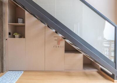 Modern staircase with storage cabinets