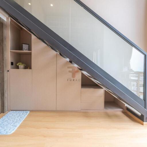 Modern staircase with storage cabinets