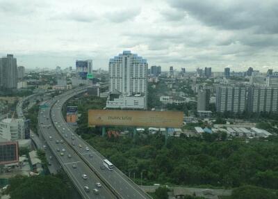 Aerial view of city with highway