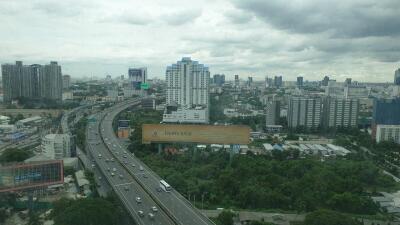 Aerial view of city with highway