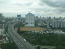 Aerial view of city with highway