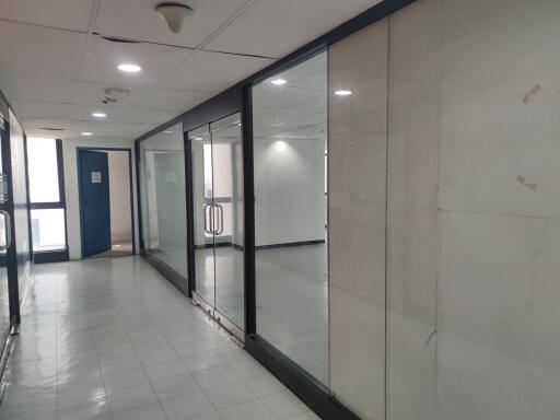 Hallway with glass panels and doors