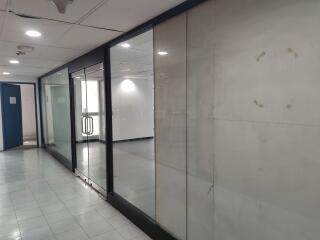 Hallway with glass partitions