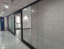 Hallway with glass partitions