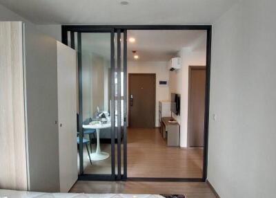 Contemporary bedroom with sliding glass door