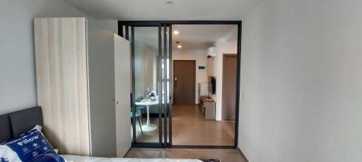 Contemporary bedroom with sliding glass door