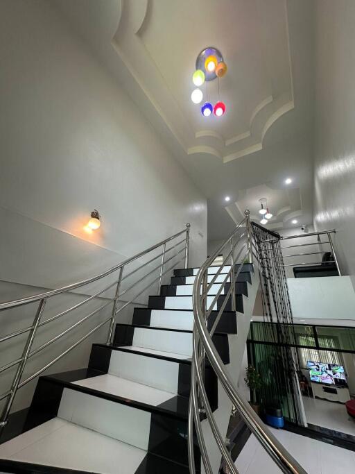 Modern staircase with unique lighting