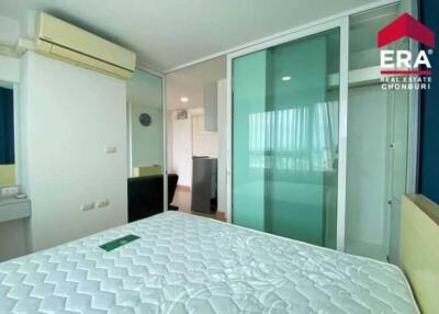 Modern bedroom with glass sliding door and air conditioning