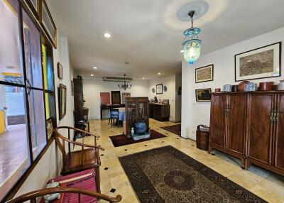 well-decorated spacious living area with traditional furnishings and decor