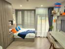 Modern bedroom with wooden furnishings and colorful cushions