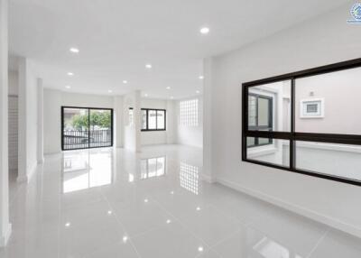 spacious and bright living area with large windows