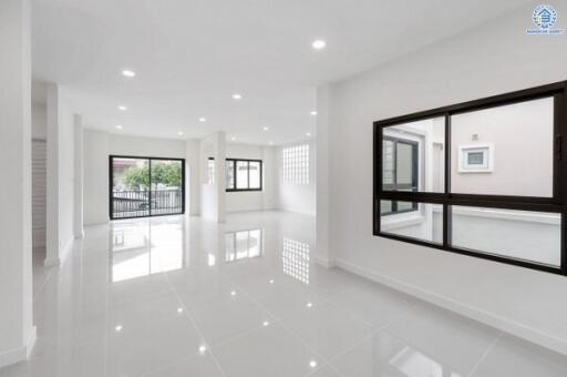 spacious and bright living area with large windows