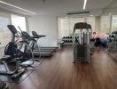 Modern gym with various exercise equipment