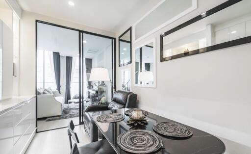 Modern living area with dining space in a property