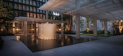 Luxurious outdoor area with water feature