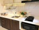 Modern kitchen with marble backsplash and appliances