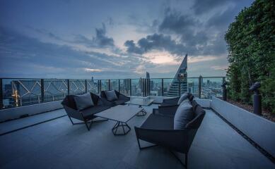 Rooftop lounge area with city view