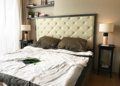 Well-furnished bedroom with double bed and nightstands