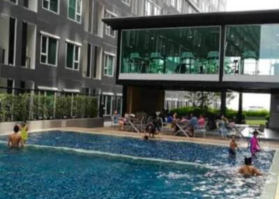 Modern high-rise building with outdoor swimming pool