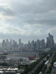 Skyline view of a city with multiple skyscrapers and buildings