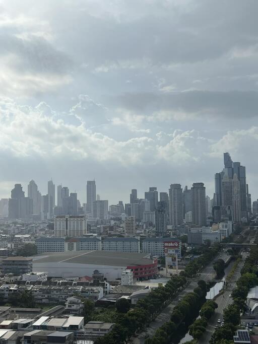 Skyline view of a city with multiple skyscrapers and buildings