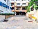 Entrance to a residential building with driveway